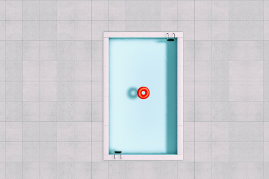 A pool with a red float on the water