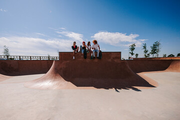 Group of Teenagers sharing moments together in a skatepark