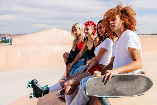 Group of Teenagers sharing moments together in a skatepark