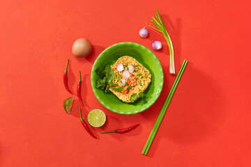 Bowl of instant noodles with pepper and onion on table, Asian food