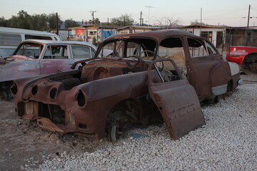 old abandoned car in the desert