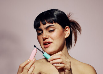 Woman happy with long lasting mascara product