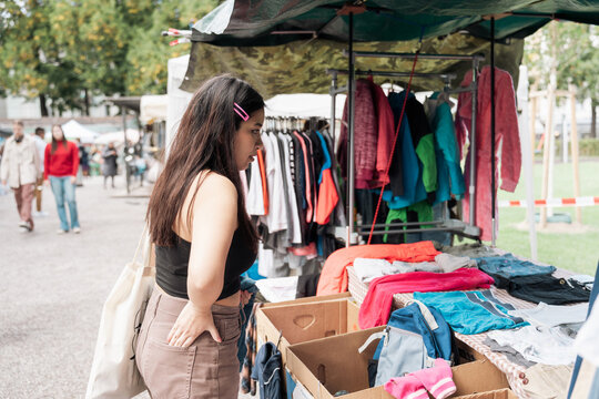Woman Thrifting at the Flea Market