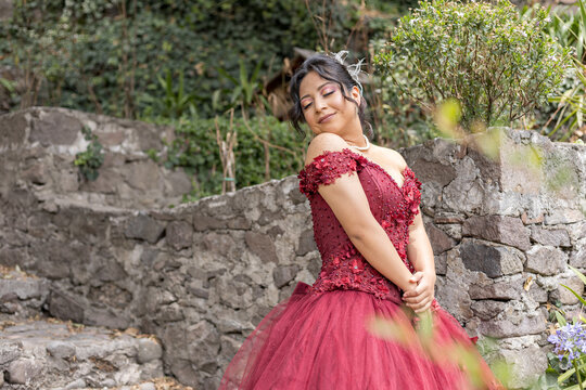 A Quinceanera Posing For A Picture