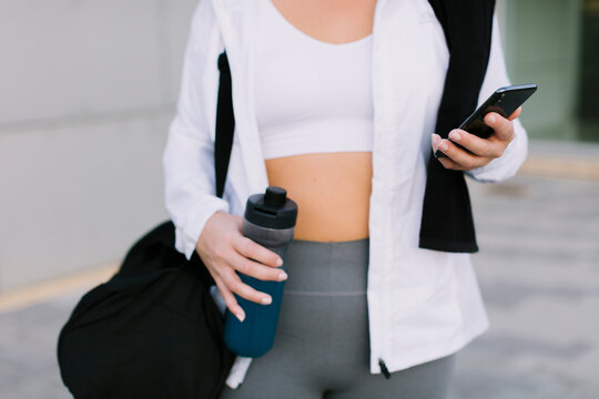 Anonymous woman using a smartphone