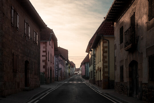 Cinematic street of old town at sunset