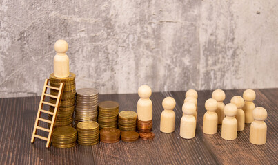 Miniature?people?walking?from?low?to?high?pile?of?coins. The?concept