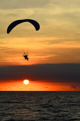 paraglider over the sea