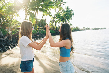 family portrait on beach and ocean in maui