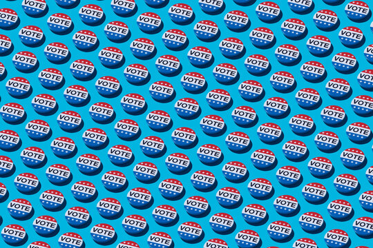 vote badges on a blue background