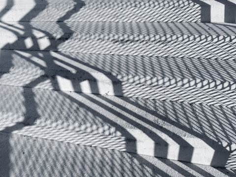 sun line shadows on a staircase