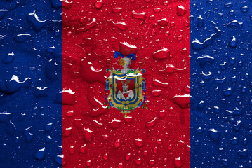 flag of Quito with rain drops