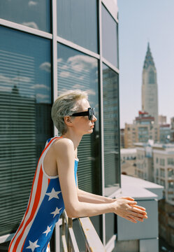 woman  wearing dress with us flag symbols 