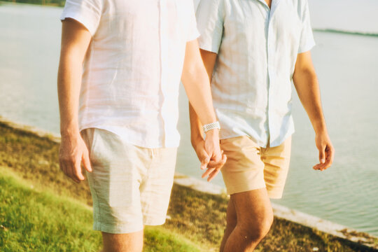 LGBT couple holding hands