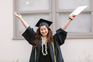 Happy high school girl graduation day