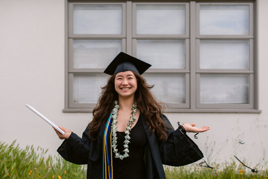 Happy high school girl graduation day