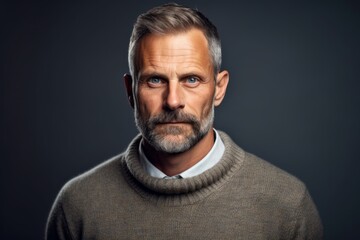 Obraz premium Portrait of a middle-aged man in a warm sweater.