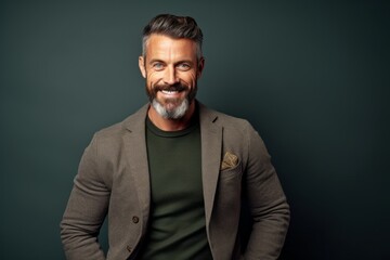 Fototapeta premium Portrait of a handsome middle-aged man in a stylish jacket. Men's beauty, fashion.
