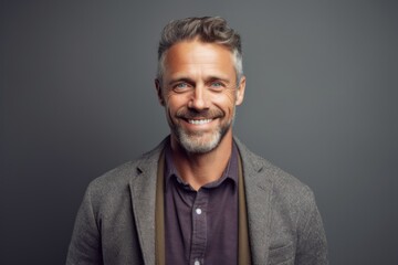 Obraz premium Portrait of a handsome middle-aged man smiling at the camera.