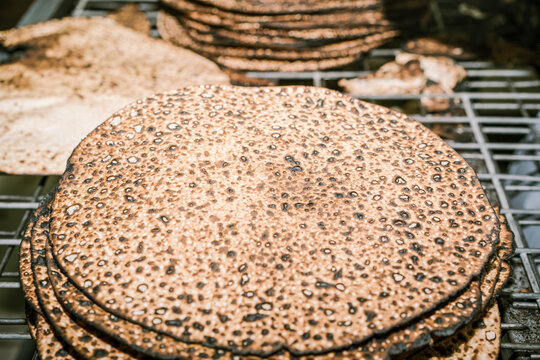 Handcrafted Shmurah Matzah In a Hasidic Bakery.