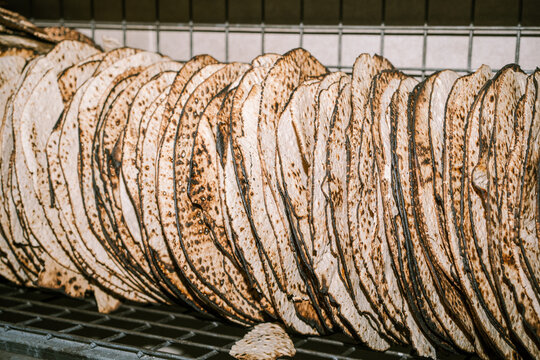 Handcrafted Shmurah Matzah In a Hasidic Bakery.