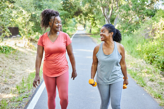 Close-up of Mature Black women friends  exercising together in nature