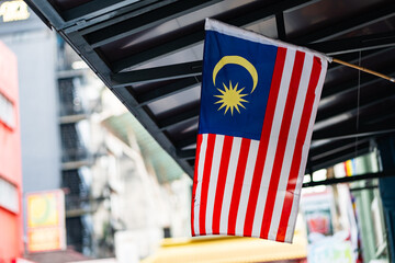 Malaysian national flag waving in the street of Kuala Lumpur, Malaysia