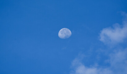 Naklejka na ściany i meble The moon is in the sky and clouds.