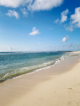 Beautiful bali beach in sunny day with cloudy sky