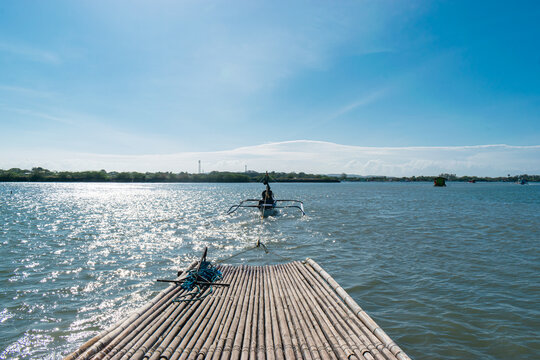 View from a floating raft overlooking the turquoise Calatagan beach. Batangas, Philippines