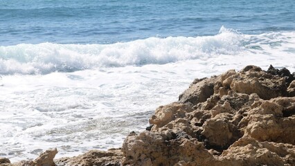 Fototapeta premium Sea waves at rocky coast