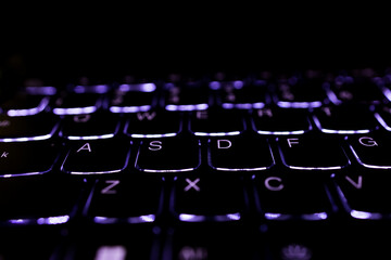 Gaming laptop keyboard detail AWSD keys 