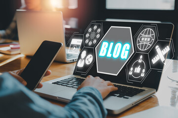 Blog concept, Person working on laptop computer with blog icon on virtual screen.