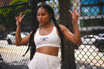 Sporty Woman In Athletic Gear Traveling Around The City