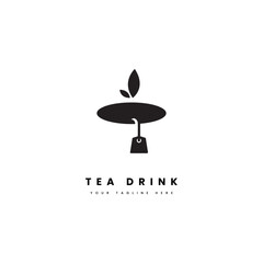 Tea drink. Silhouette tea cup with tea leaves, for tea drink product logos.