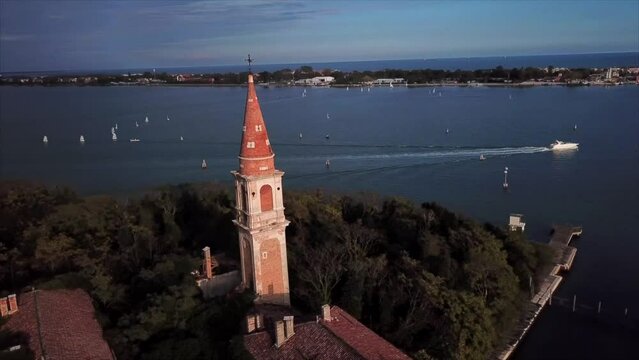 POVEGLIA ISLAND VENICE DRONE SHOT PAN AROUND STEEPLE SPIRE