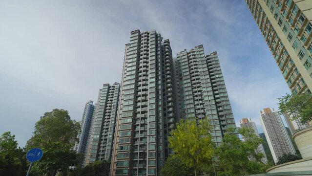 Urban Skyline Symmetry: Gimbal Shot of Hong Kong Residential Buildings in Perfect Balance