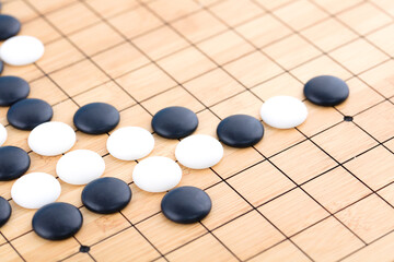 A game of black pieces on a board