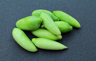 Ivy gourd on black background close-up view 