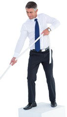 Digital png photo of focused caucasian businessman pulling rope on transparent background