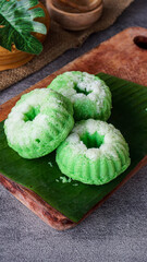Indonesian traditional cake it called Putu ayu cake or kue putu ayu is sweety cake made from flour...
