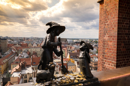 Wroclaw, Poland - May 2022 Dwarfs. Witches Tekla and Martynka Polish: Czarownice Tekla I Martynka on the observation deck of St. Mary Magdalenes Church. One of the most famous Wroclaw gnomes