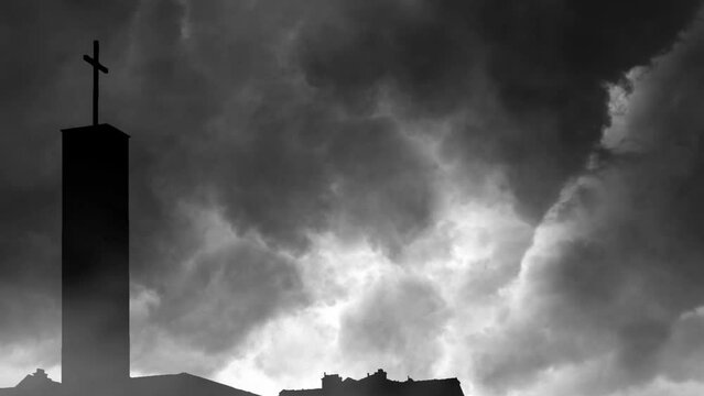 4k silhouette, cross tower thunderstorm background.