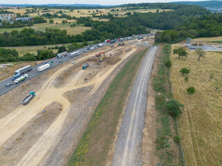 Motorway construction site with construction vehicles and machines, new construction and renovation of the A8 near Pforzheim, drone recording