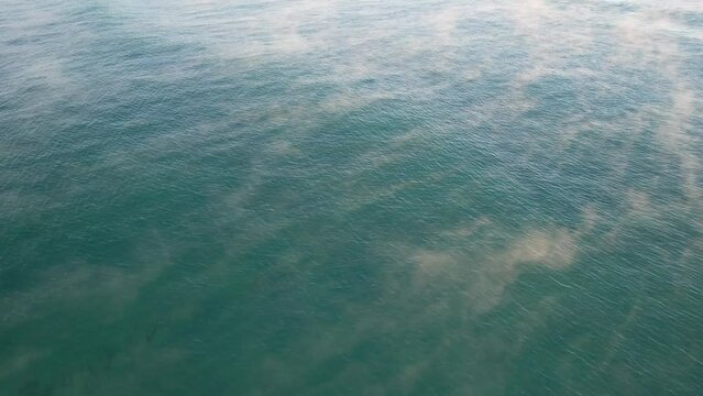 Fog Above Blue Sea At Coolum Beach In Sunshine Coast, Queensland. aerial