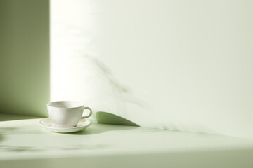A room with various objects such as warm sunlight, shadows of grass leaves, a vase on a table, and cups