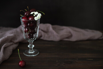 Ripe cherries on the kitchen table