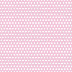 A pink and white polka dot background. A pink and white polka dot background. Great for holidays or other usages for scrap booking, gift wrapping paper, card making or other various usages. Small spot - obrazy, fototapety, plakaty