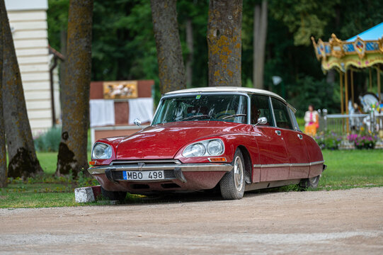 Red vintage car Citroen DS Classic in Pakruojis manor park