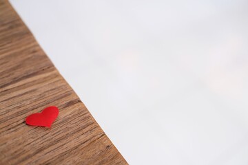 Love Valentines day background with red hearts. copy space on wooden table